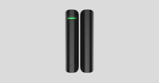 Black security motion detector with green light